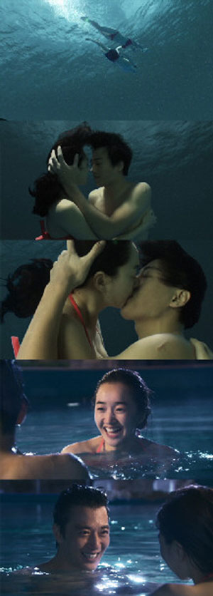 ドラマ「千日の約束」の水中キスシーンを撮影中の女優のスエと俳優のキム・レウォン。