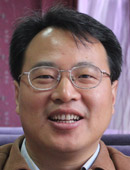 北京大学国際政治経済研究センター主任教授の王勇氏（４６）。