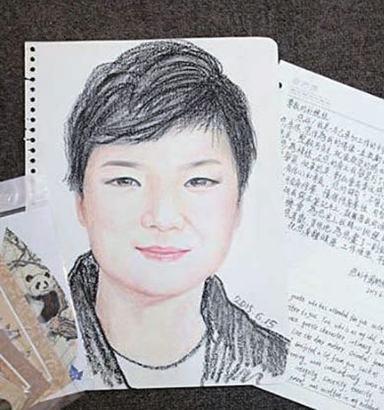 ３０日、休暇中の朴槿恵大統領がフェイスブックに投稿した中国青年が送ってきた手紙と肖像画（写真＝朴大統領のフェイスブック）