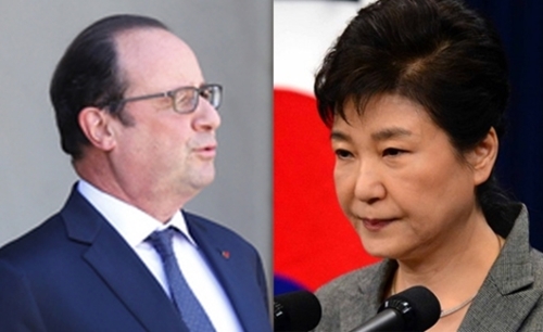 ６月３日、フランス・パリのエリゼ宮殿で会った朴槿恵大統領（右）とフランソワ・オランド大統領（左）。両大統領は現在、両国でそれぞれ史上最低の支持率を記録している。