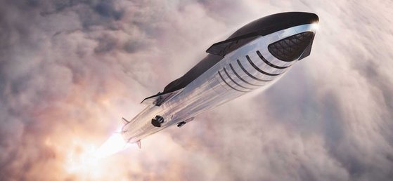 スペースＸのロケット旅客機が宇宙に打ち上げられている。前方に帯のように見える部分が乗客が乗る空間。［写真　スペースＸ］