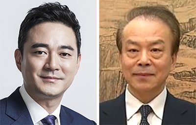洪正道（ホン・ジョンド）中央日報・ＪＴＢＣ代表取締役副会長（左）、何平・新華社社長（右）