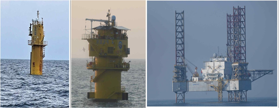 韓中両国の２００海里排他的経済水域（ＥＥＺ）が重なる西海（ソヘ、黄海）暫定措置水域に中国が一方的に設置した構造物の写真を、国民の力の厳泰永（オム・テヨン）議員が先月２４日に公開した。左から深藍１号（２０１８年）、深藍２号（２０２４年）、管理施設として設置した石油ボーリング設備形態の構造物（２０２２年）。　［聯合ニュース］