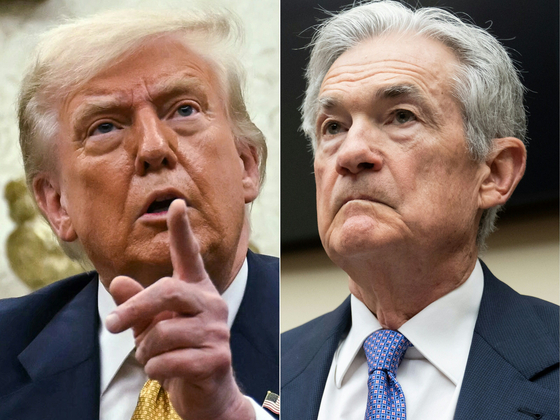  トランプ米大統領とＦＲＢのパウエル議長。［写真　ＡＦＰ＝聯合ニュース］