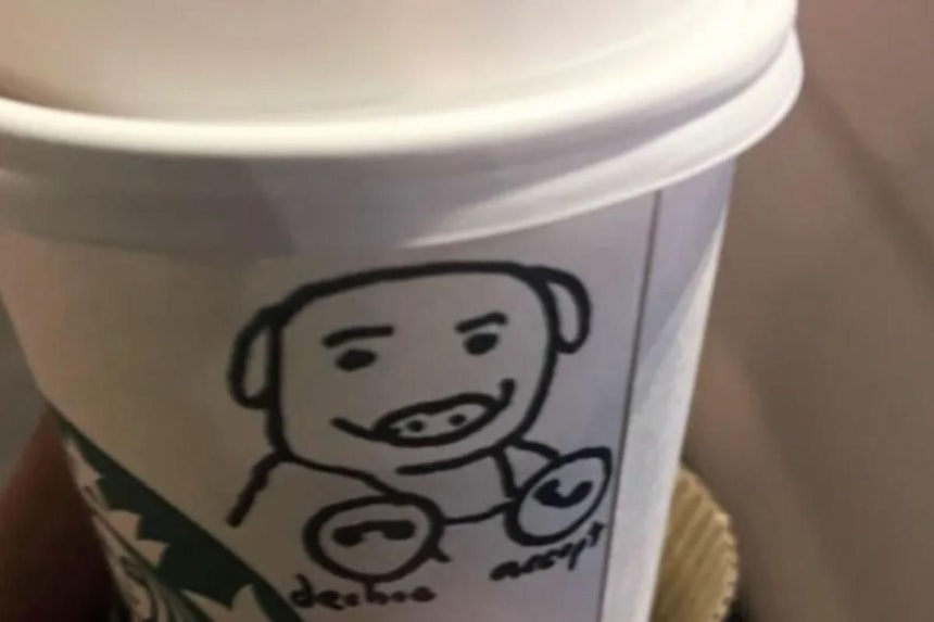 ブタの絵が描かれた紙コップ［写真 X キャプチャー］