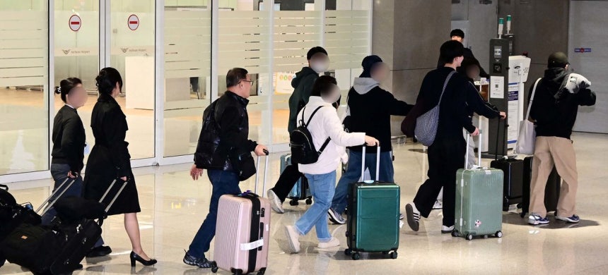 5日、仁川国際空港に到着した韓国人 ［ニュース1］