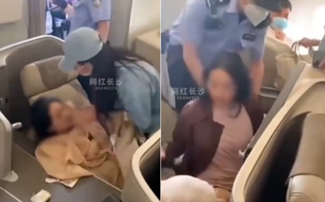   航空機のビジネスクラスから警察に連れ出される女性。［写真 SNS］